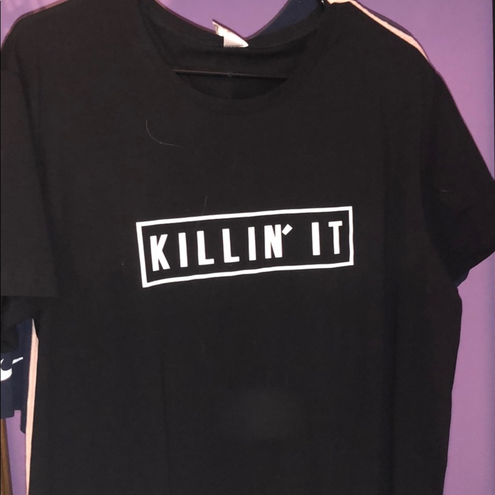 Black tee “killin it”